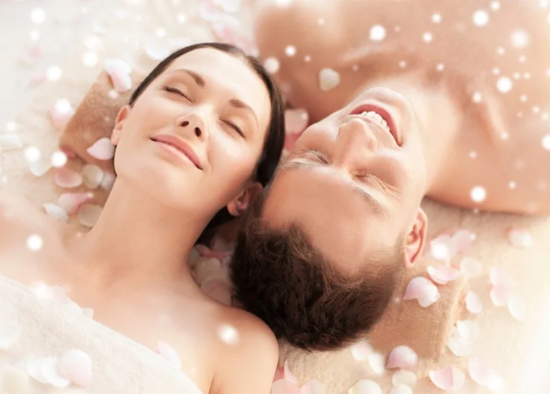 Couple enjoying a spa massage together