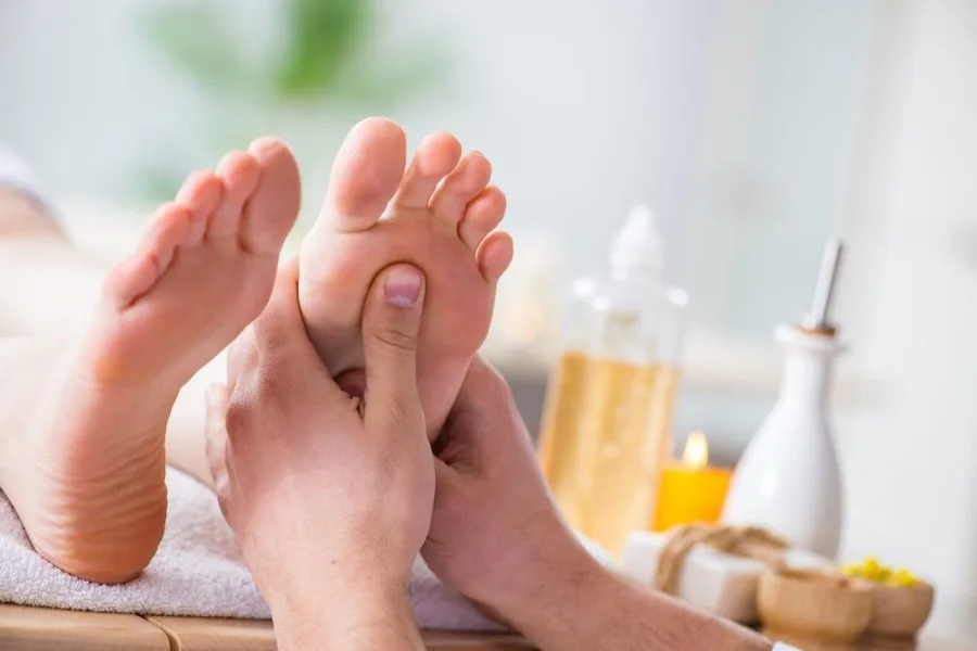 Foot reflexology massage treatment